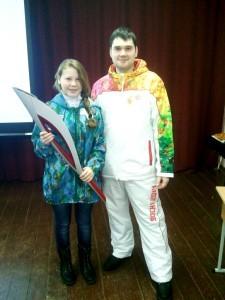 Анна Рылова и Николай Филинков с Олимпийским факелом
